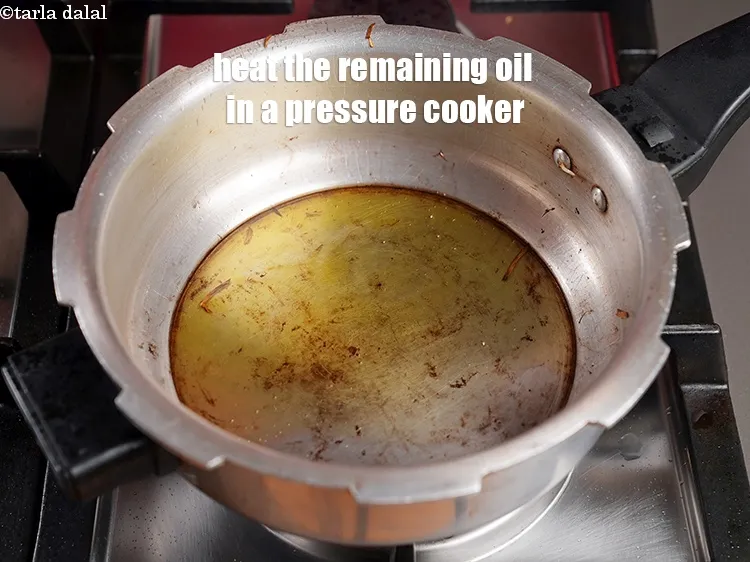 Step 15 – Heat the remaining 2 tablespoons of oil, in a pressure cooker.