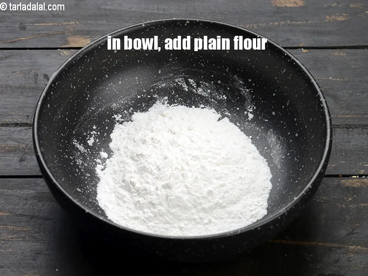 Step 15 – In a bowl, add 2 tbsp plain flour.