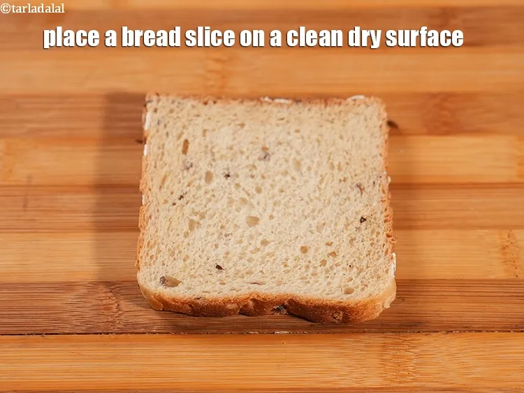 Step 15 – Place a bread slice on a clean dry surface.
