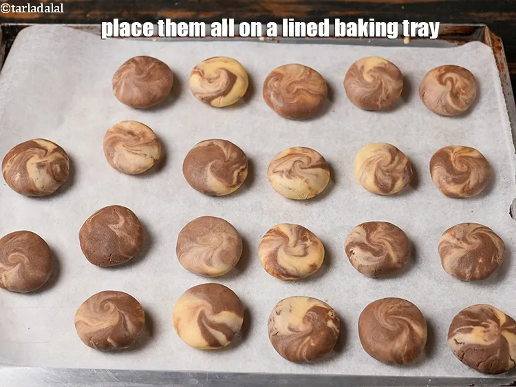 Step 15 – Place them all on a lined baking tray.