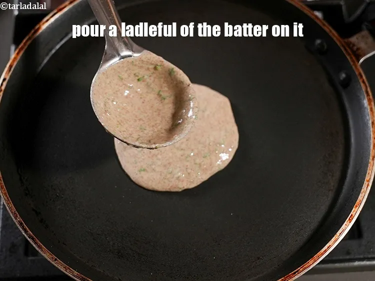 Step 15 – Pour a ladleful of the batter on it.