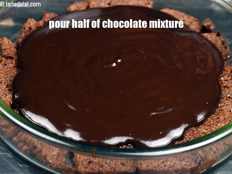 Step 15 – Pour half of the chocolate mixture.