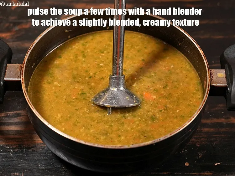 Step 15 – Pulse the soup a few times with a hand blender to achieve a slightly blended, …