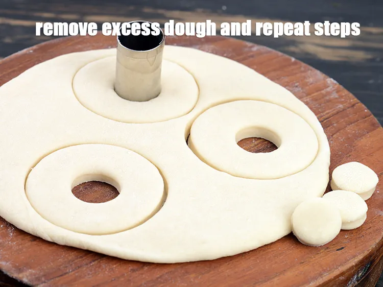 Step 15 – Remove the excess dough and repeat steps to make remaining 13 more doughnuts.