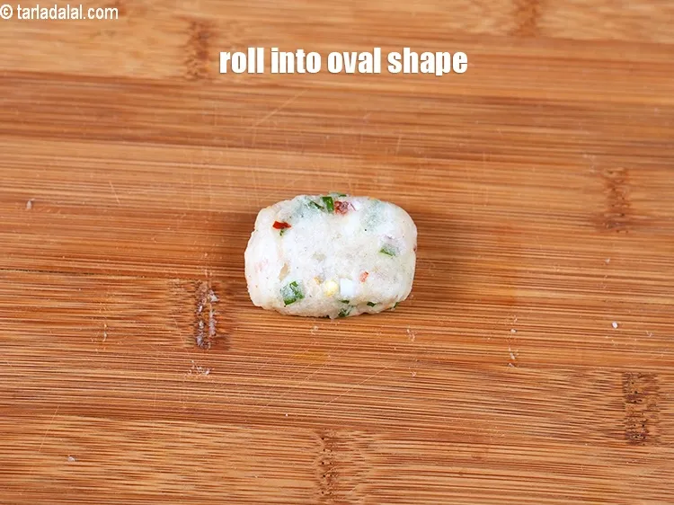 Step 15 – Roll each portion into a small oval shape.