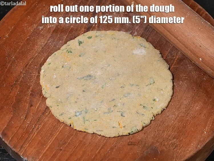 Step 18 – <meta charset="UTF-8" />Roll out one portion of the dough into a circle of 125&nbsp;mm. (5") …