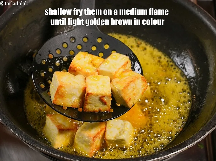 Step 15 – Shallow fry them on a medium flame until light golden brown in colour.