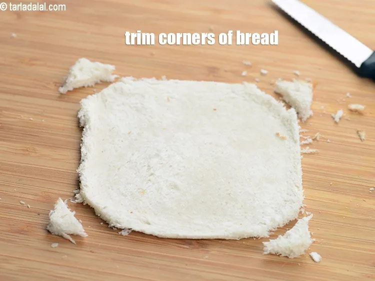 Step 15 – Then trim&nbsp;the corners of bread.