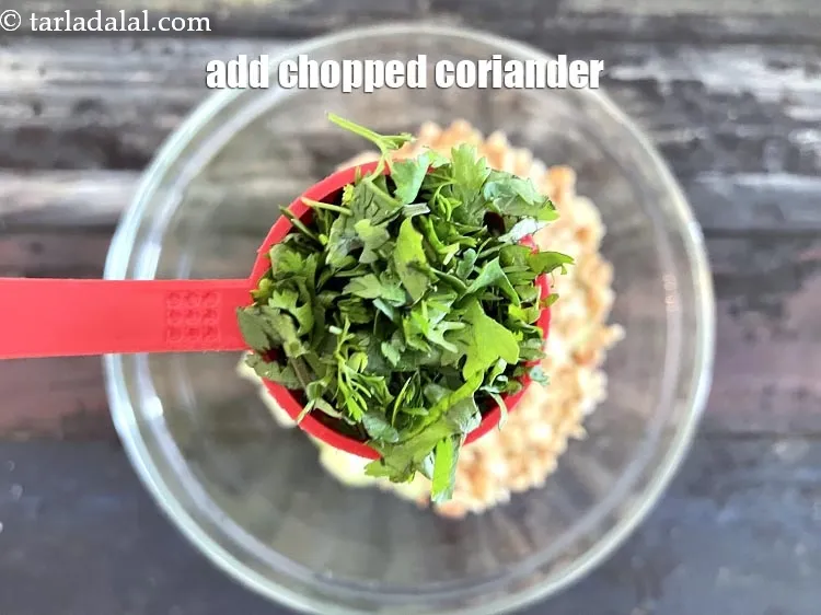 Step 17 – Add&nbsp;2 tbsp&nbsp;finely&nbsp;<a href="https://tarladalal.com/glossary-chopped-coriander-783i">chopped coriander (dhania)</a>&nbsp;(optional).