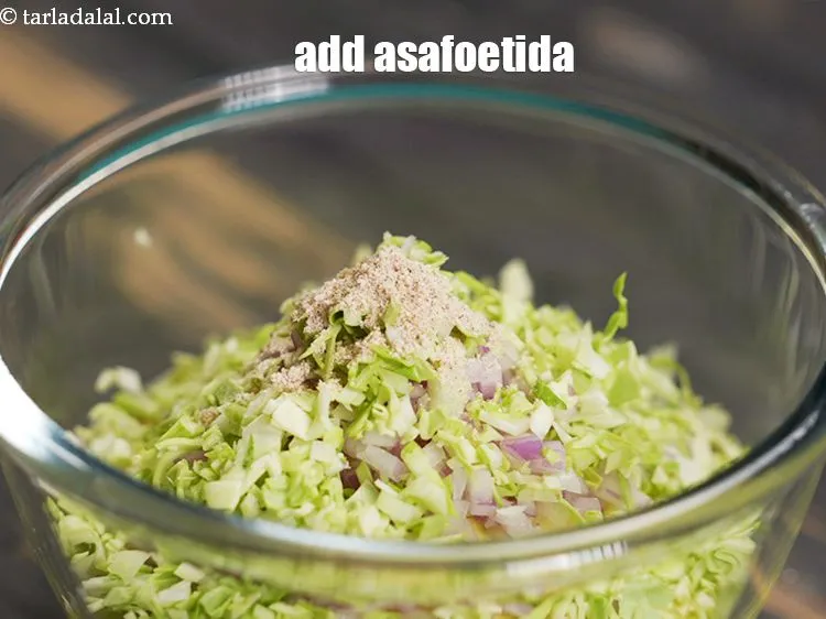 Step 15 – Add 1/4 tsp&nbsp;<a href="https://www.tarladalal.com/glossary-asafoetida-hing-113i">asafoetida (hing)</a>.&nbsp;