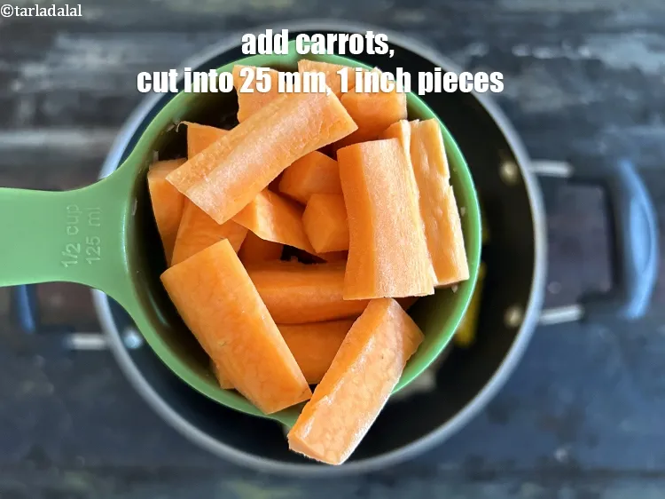 Step 15 – Add&nbsp;<meta charset="UTF-8" />1/2 cup&nbsp;<a href="glossary-carrot-cubes-730i">carrots , cut into 25mm (1&rdquo;) pieces</a>.