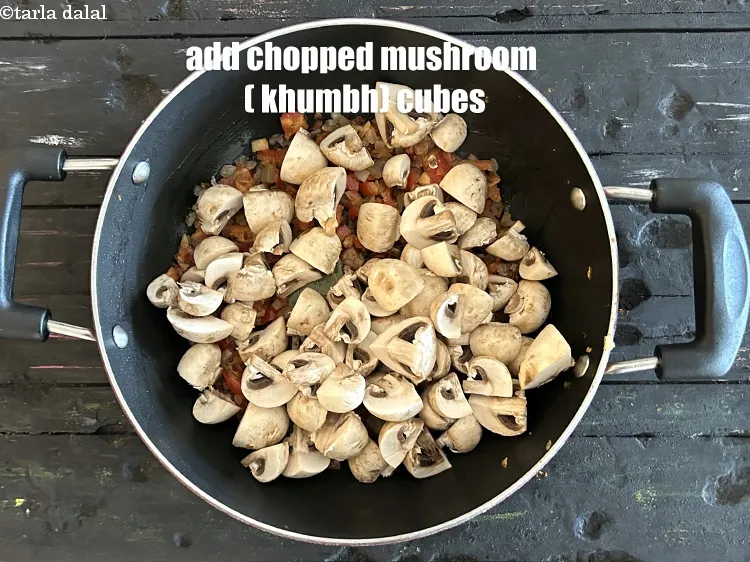 Step 22 – Add&nbsp;<meta charset="UTF-8" />2 cups&nbsp;<a href="glossary-mushroom-cubes-2282i">mushroom (khumbh) cubes</a>.