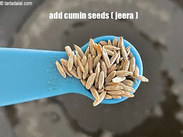 Step 15 – <p>Add<strong> </strong>1/4 tsp <a href="https://www.tarladalal.com/glossary-cumin-seeds-jeera-zeera-381i"><strong>cumin seeds (jeera)</strong></a><strong>.</strong></p>
