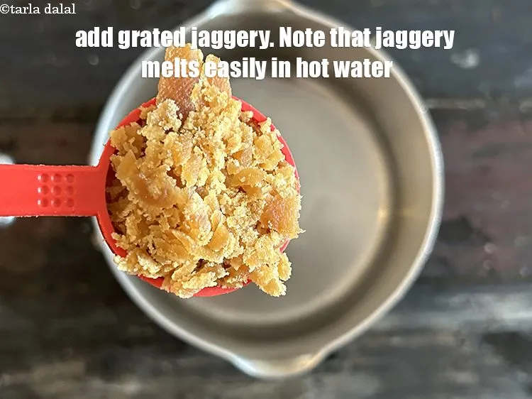 Step 15 – Add&nbsp;<meta charset="UTF-8" />2 tbsp&nbsp;<a href="glossary-grated-jaggery-947i">grated jaggery (gur)</a>.&nbsp;Note that jagerry melts easily in hot water.