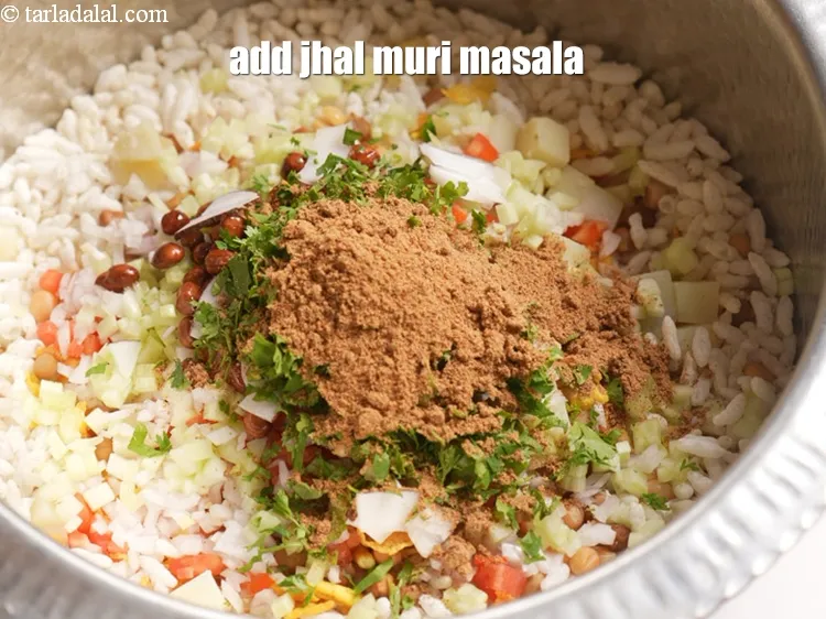 Step 16 – Add 2 tbsp <a href="https://www.tarladalal.com/glossary-jhal-muri-masala-2811i">jhal muri masala</a>.