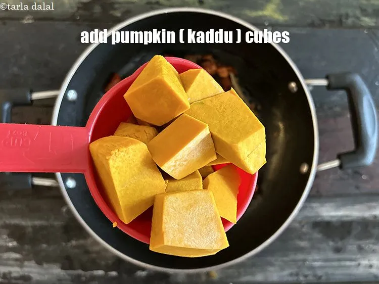 Step 15 – Add&nbsp;<meta charset="UTF-8" />1 cup&nbsp;<a href="glossary-red-pumpkin-cubes-1530i">red pumpkin (bhopla / kaddu) cubes</a>.