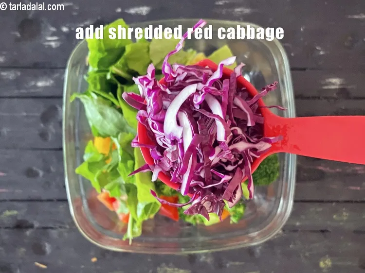 Step 17 – Add 1/4 cup&nbsp;<a href="https://www.tarladalal.com/glossary-shredded-red-cabbage-2262i">shredded red cabbage</a>.