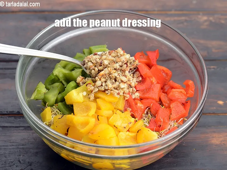 Step 27 – Add the peanut dressing.