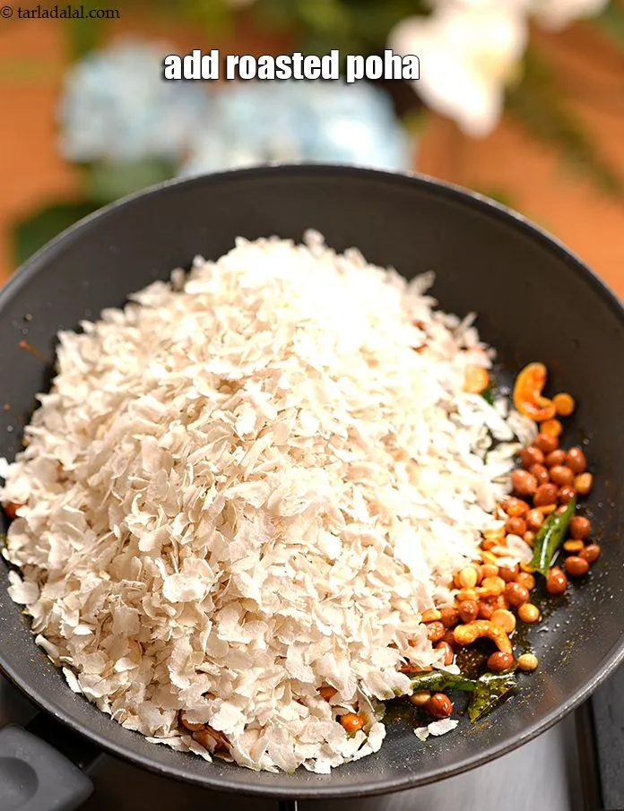 Step 13 – Add the roasted poha.