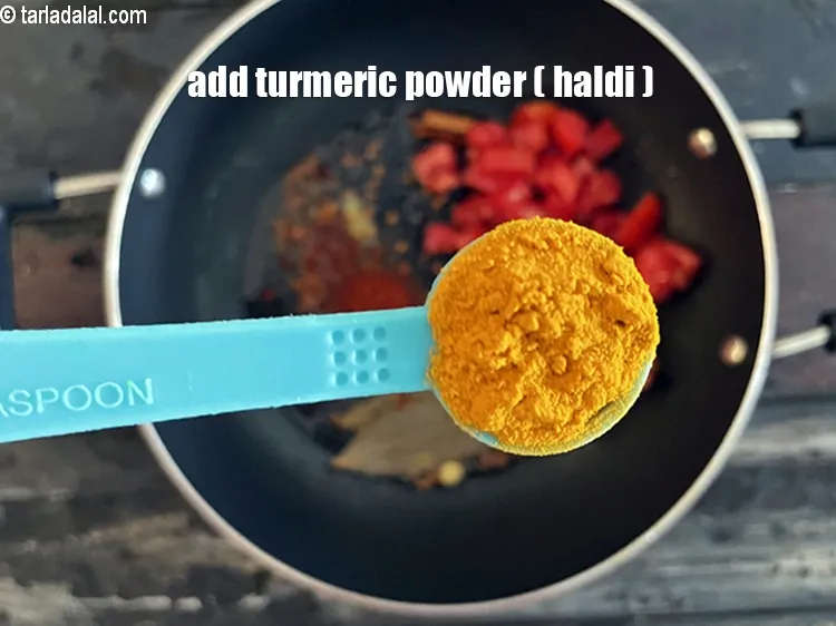 Step 20 – Add&nbsp;<meta charset="UTF-8" />1/2 tsp&nbsp;<a href="glossary-turmeric-powder-haldi-645i">turmeric powder (haldi)</a>.