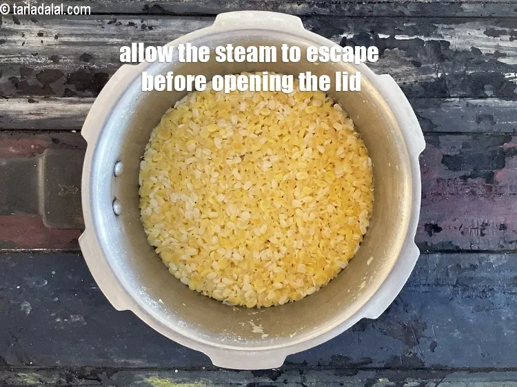 Step 15 – Allow the steam to escape before opening the lid.
