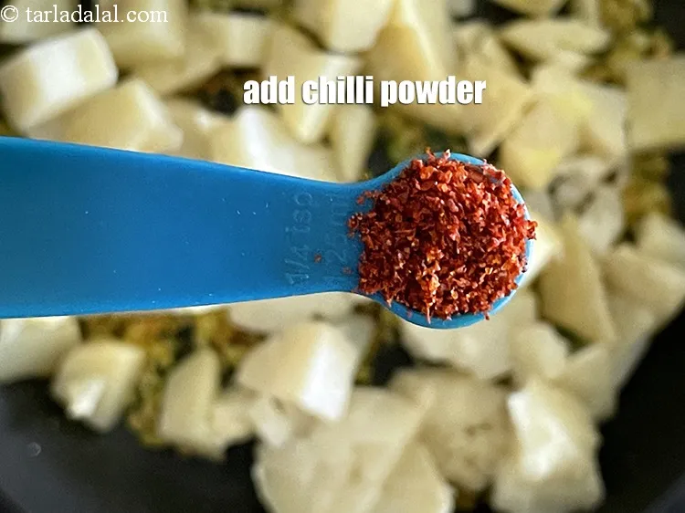 Step 58 – Add&nbsp;<meta charset="UTF-8" />1/4 tsp&nbsp;<a href="glossary-chilli-powder-red-chilli-powder-339i">chilli powder</a>.
