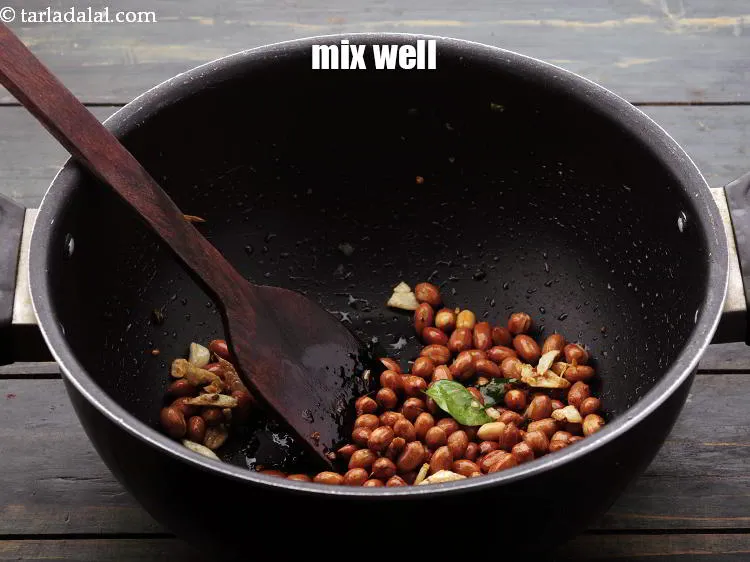 Step 17 – Mix <strong>bhadang recipe | spicy puffed rice chivda | Indian bhadang</strong> &nbsp;and saut&eacute; on a …