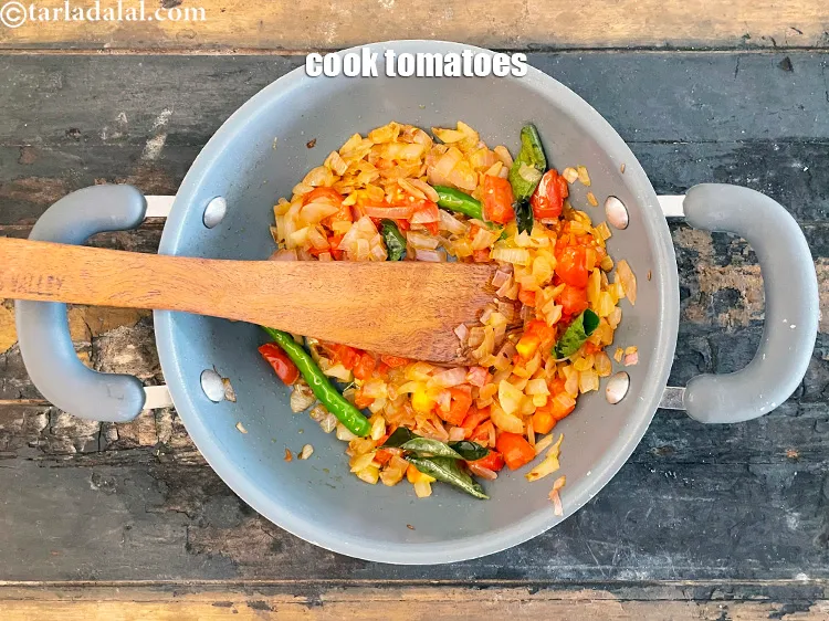 Step 16 – Cook the tomatoes for 3 minutes on medium flame.