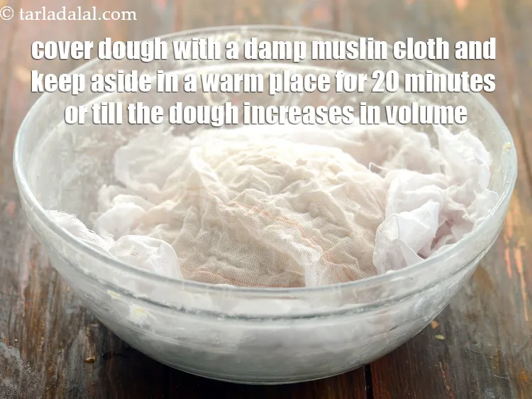 Step 13 – Shape the dough into a proper round using both your hands while tucking the edges …