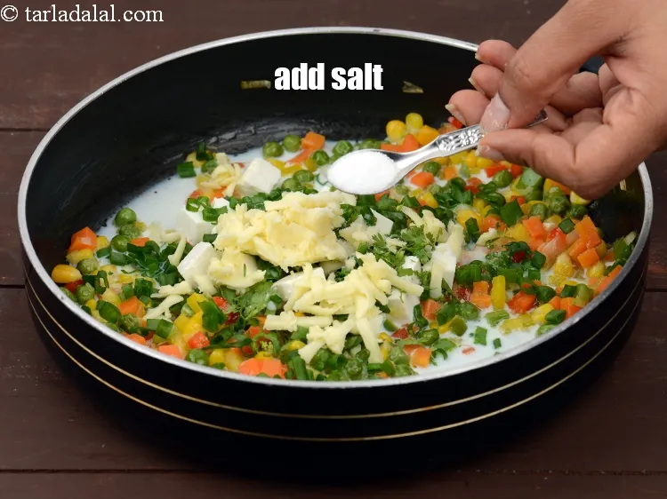 Step 14 – Add <a href="https://tarladalal.com/glossary-salt-namak-table-salt-418i">salt</a>.&nbsp;