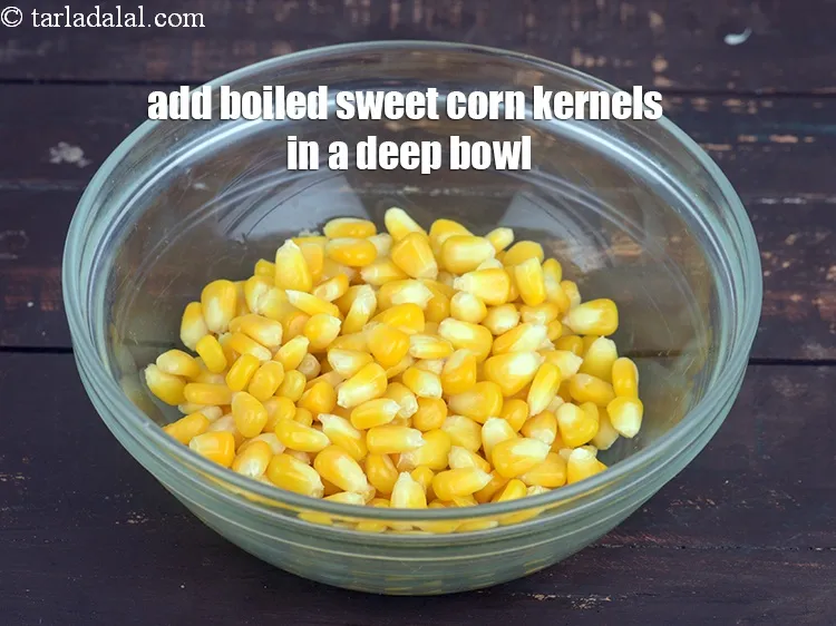 Step 21 – For the corn topping, add 1 cup&nbsp;<a href="https://www.tarladalal.com/glossary-boiled-sweet-corn-kernels-153i">boiled sweet corn kernels (makai ke dane)</a>&nbsp;in a …