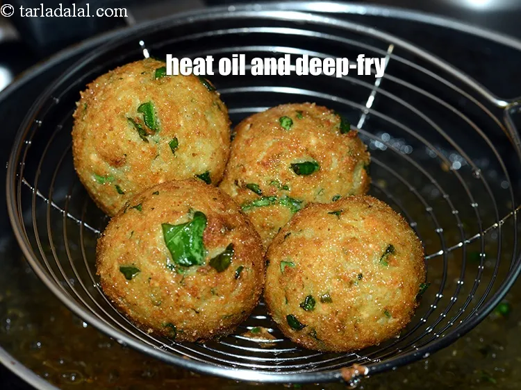 Step 14 – Heat the oil in a kadhai and deep-fry 3 to 4 balls at a time …