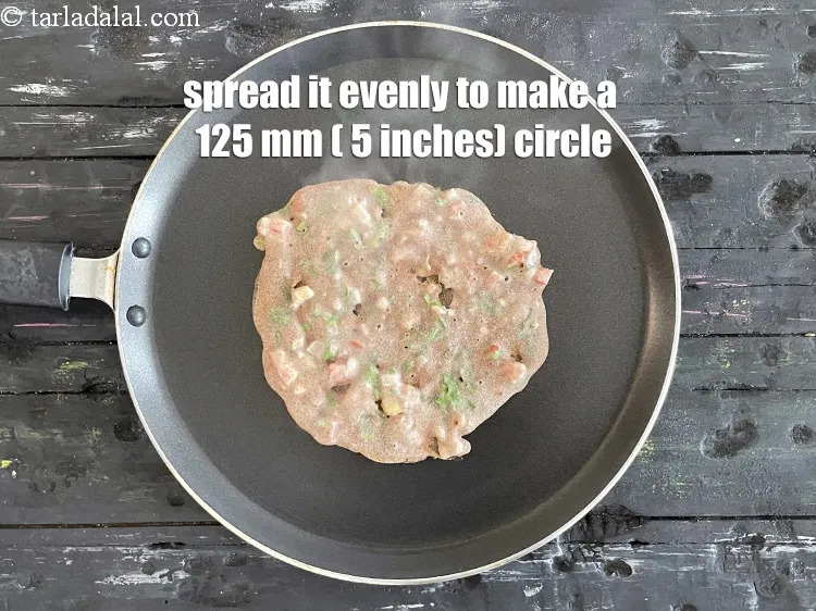Step 15 – Spread it evenly to make a 125 mm. (5&rdquo;) diameter thin circle.