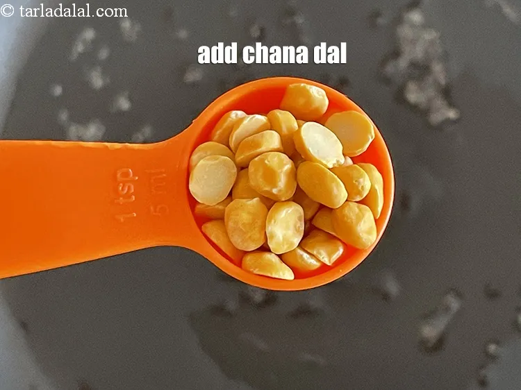 Step 15 – Add 2&nbsp;tsp&nbsp;<a href="glossary-chana-dal-split-bengal-gram-285i">chana dal (split bengal gram)</a>.
