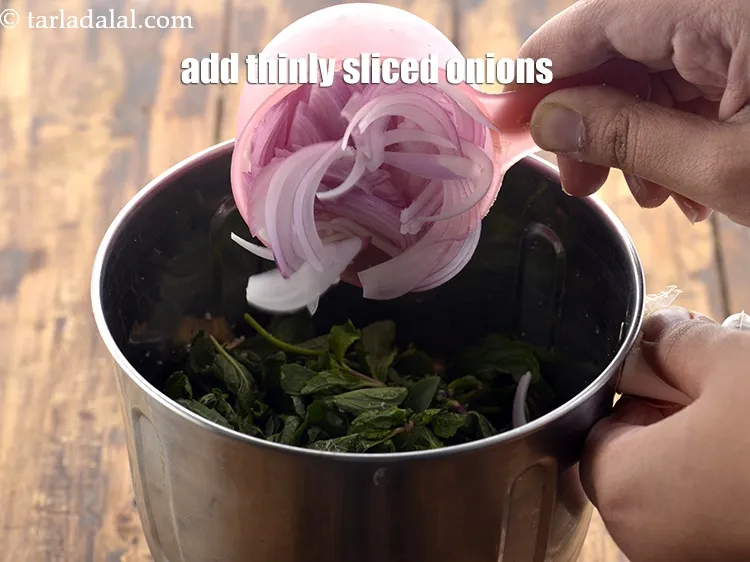 Step 15 – Now add 1/2 cup&nbsp;thinly&nbsp;<a href="https://www.tarladalal.com/glossary-sliced-onions-745i">sliced onions</a>.
