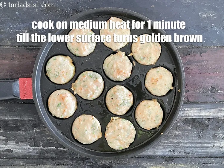 Step 20 – Cook on medium heat for 1 minute till the lower surface becomes golden brown.