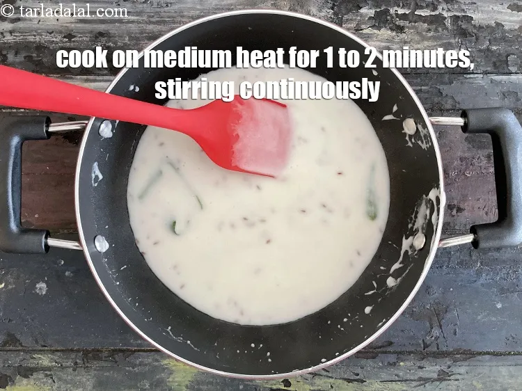 Step 16 – Cook on a medium flame for 1 to 2 minutes, while stirring continuously. Keep aside.