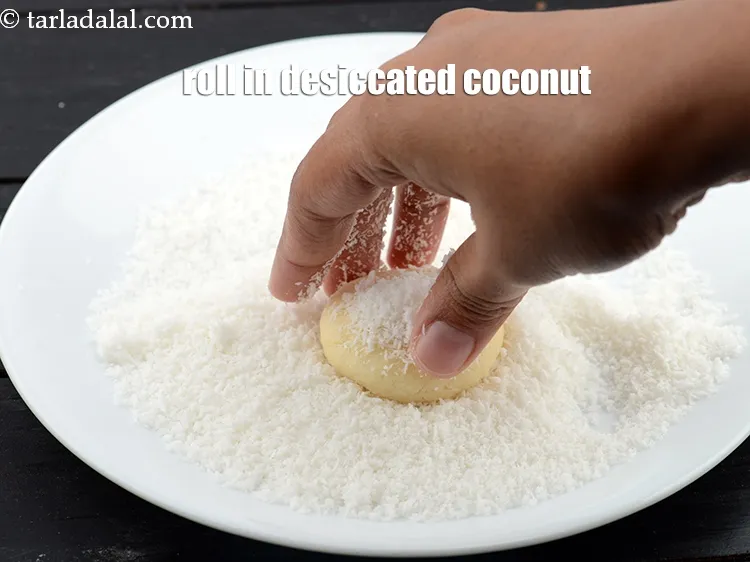 Step 15 – Then roll in desiccated coconut.<br /> &nbsp;