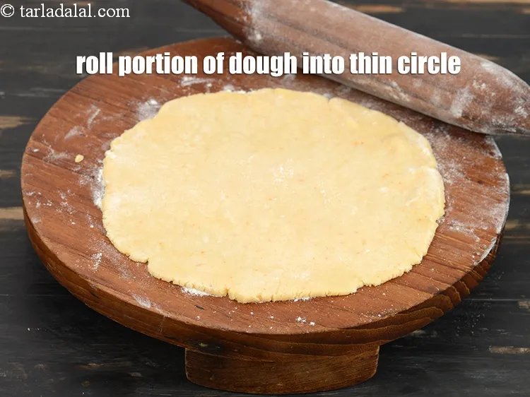 Step 15 – Roll a portion of the dough into a 175 mm. (7&rdquo;) diameter thin circle using …