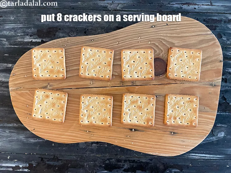 Step 16 – Put 8 crackers on a serving board or plate.