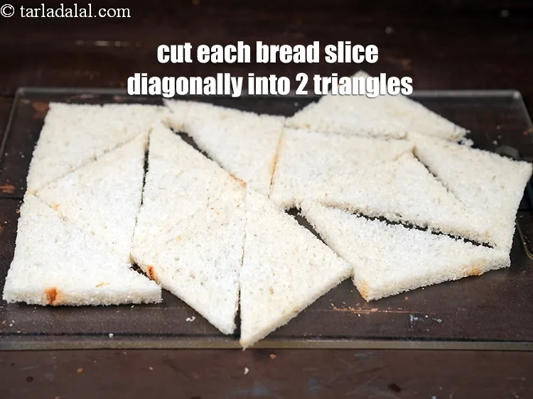 Step 16 – Cut each bread slice diagonally into 2 triangles.