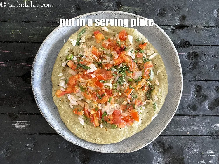 Step 47 – Put healthy <strong>moong dal uttapam&nbsp;</strong>in&nbsp;a serving plate.