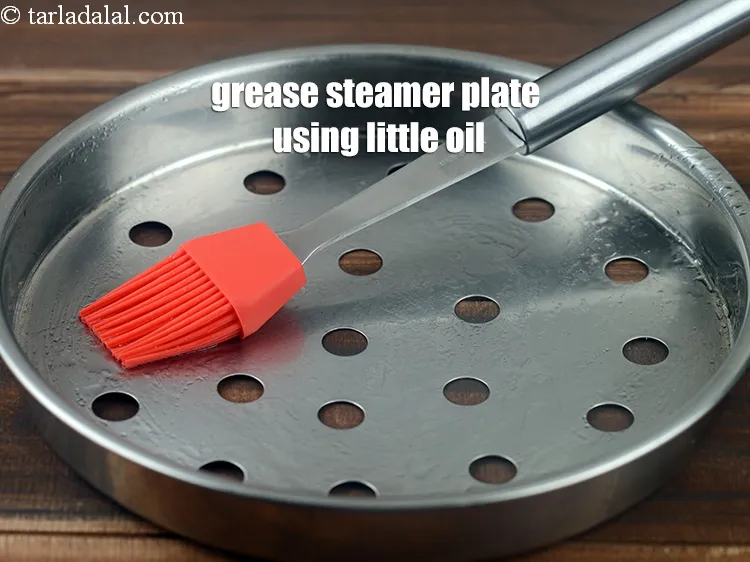 Step 15 – Grease the steamer plate using little oil.