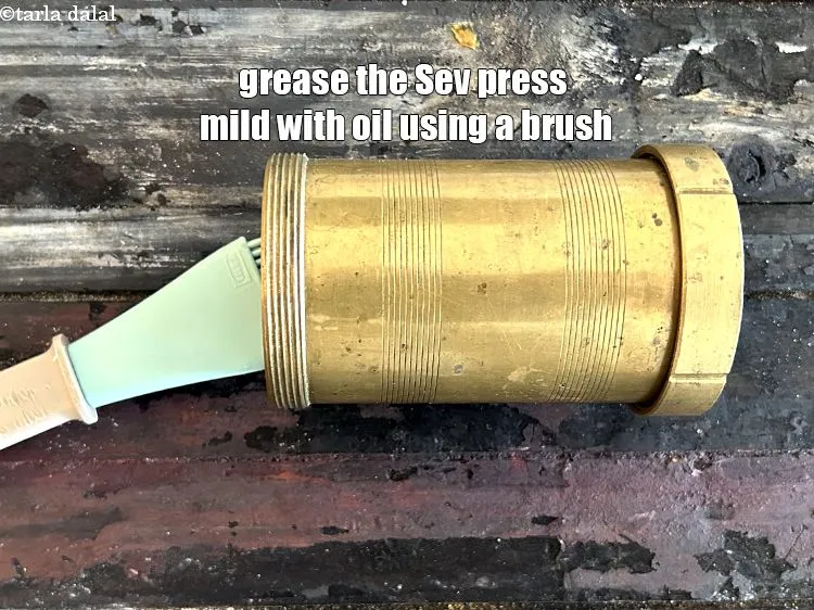 Step 21 – <meta charset="UTF-8" /> Grease the &ldquo;sev press&quot; mould with little oil using a brush to …