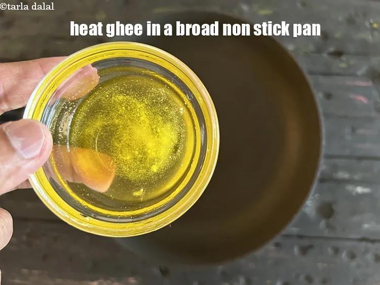 Step 15 – <meta charset="UTF-8" />Heat 1 tsp of ghee in a broad non&ndash;stick pan.