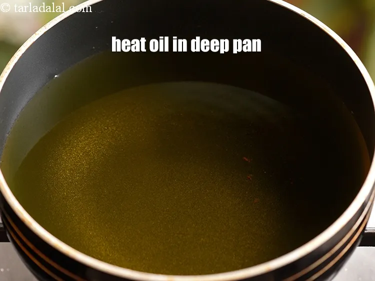 Step 15 – Heat the oil in a deep non-stick pan.