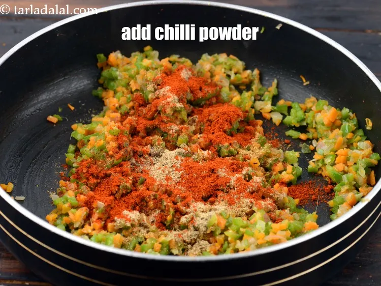 Step 15 – Add 1 1/2 tsp&nbsp;<a href="https://www.tarladalal.com/glossary-chilli-powder-red-chilli-powder-339i">chilli powder</a>.