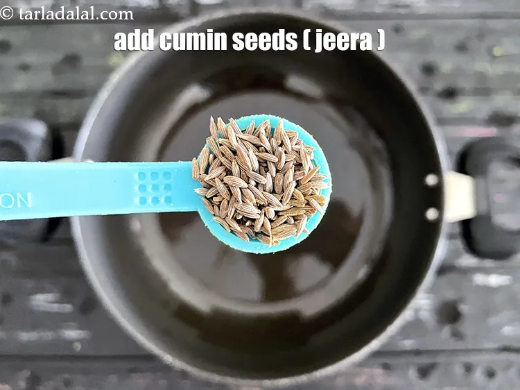 Step 18 – <html><head></head><body><p>Add&nbsp;1/2 tsp&nbsp;<a href="glossary-cumin-seeds-jeera-zeera-381i">cumin seeds (jeera)</a>.</p></body></html>