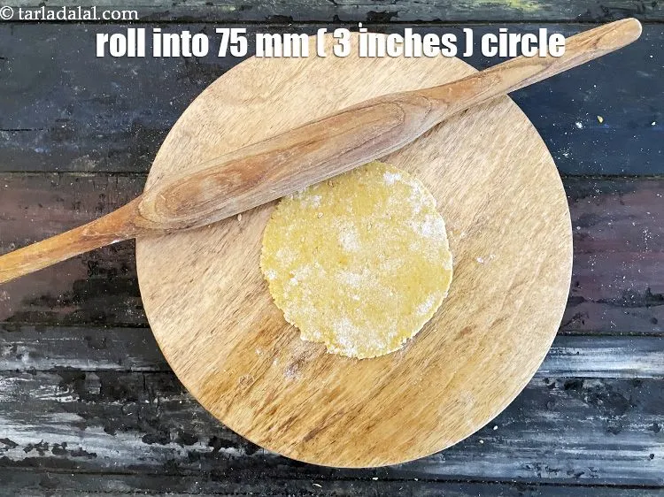 Step 19 – Roll out a portion of the dough into a 75&nbsp;mm. (3&quot;) diameter circle using a …