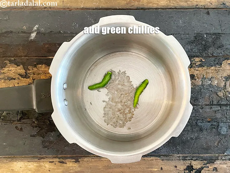 Step 32 – Add&nbsp;<meta charset="UTF-8" />2&nbsp;<a href="glossary-slit-green-chillies-1856i">green chillies , slit</a>.